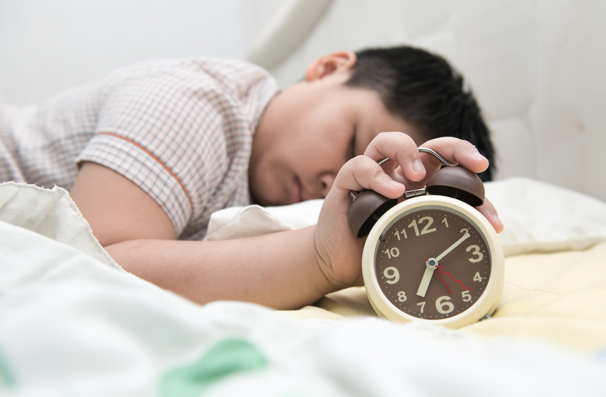 Звичка скреготіти зубами під час сну може бути ознакою того, що дитина зазнає булінгу